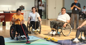 旱地冰壶“撞”开自卑心门——记大同市旱地冰壶队副队长樊天风
